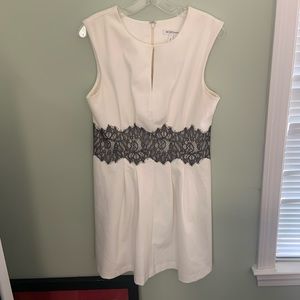 BCBG white fit and flare dress with black lace.